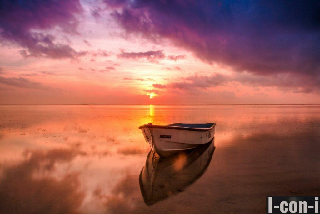 White Row Boat on Body of Water